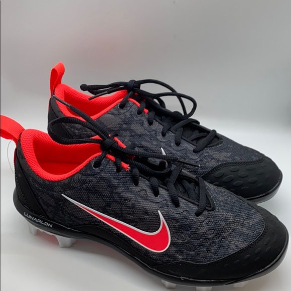 orange and black softball cleats